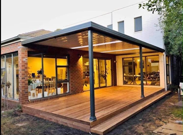 Finished alfresco deck and roof structure attached to the rear of a house